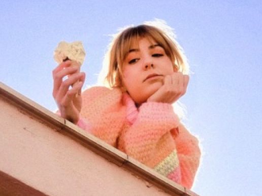 Imatge de fons
           difuminada